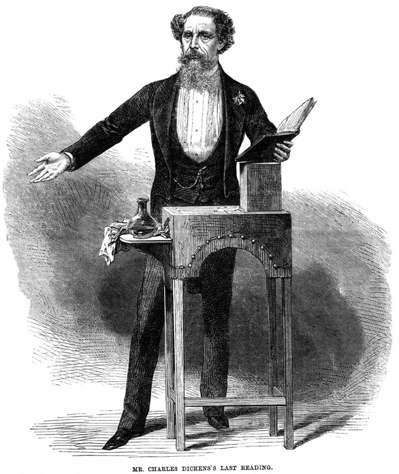 English novelist Charles Dickens gives a public reading, circa 1858