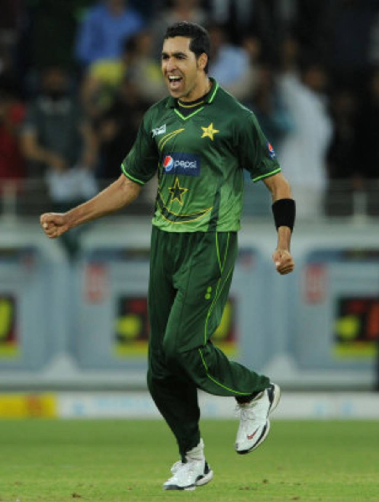 Umar Gul's three wickets lead Pakistan to victory, on a day where the crowds came at last in the UAE&nbsp;&nbsp;&bull;&nbsp;&nbsp;Getty Images