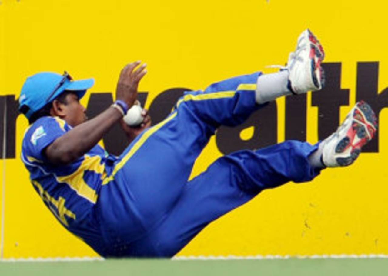Rangana Herath completes a stunning one-handed catch, Australia v Sri Lanka, Brisbane, CB Series 1st final, March 4, 2012 