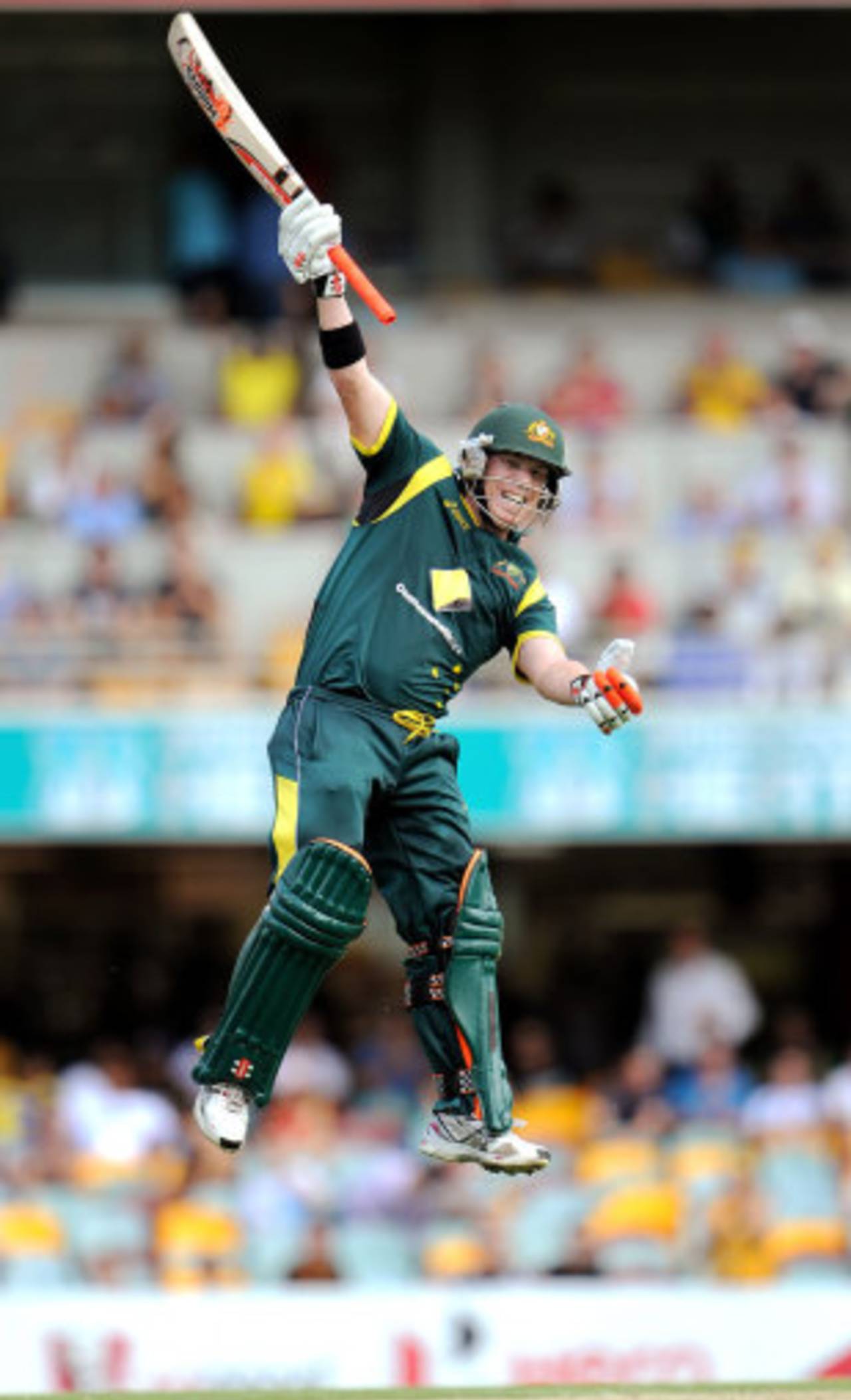 David Warner pulls out his trademark leap to celebrate his first ODI century&nbsp;&nbsp;&bull;&nbsp;&nbsp;AFP
