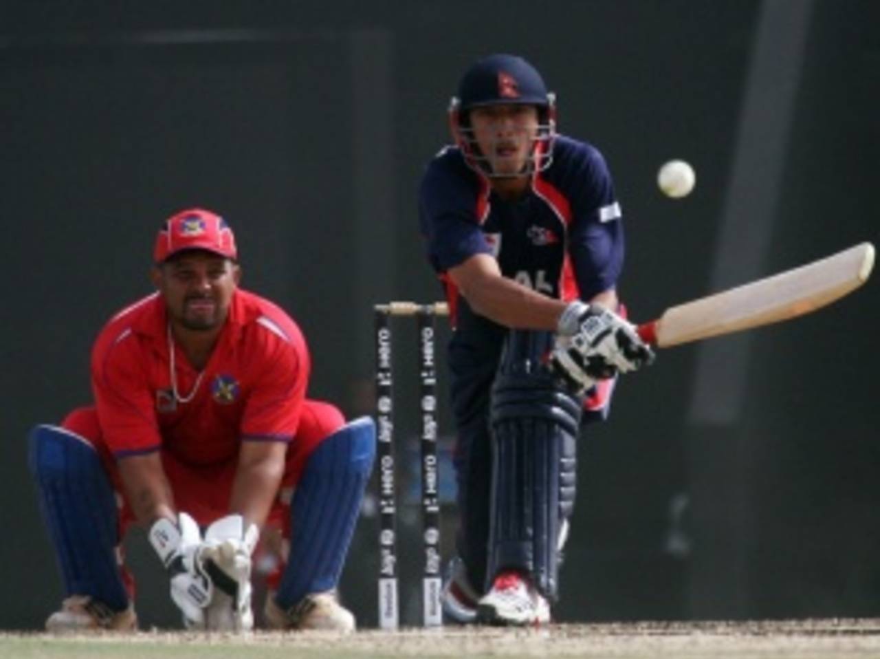 Paras Khadka reverse-sweeps during his half-century, Bermuda v Nepal, ICC World Twenty20 Qualifier, Abu Dhabi, March 18, 2012