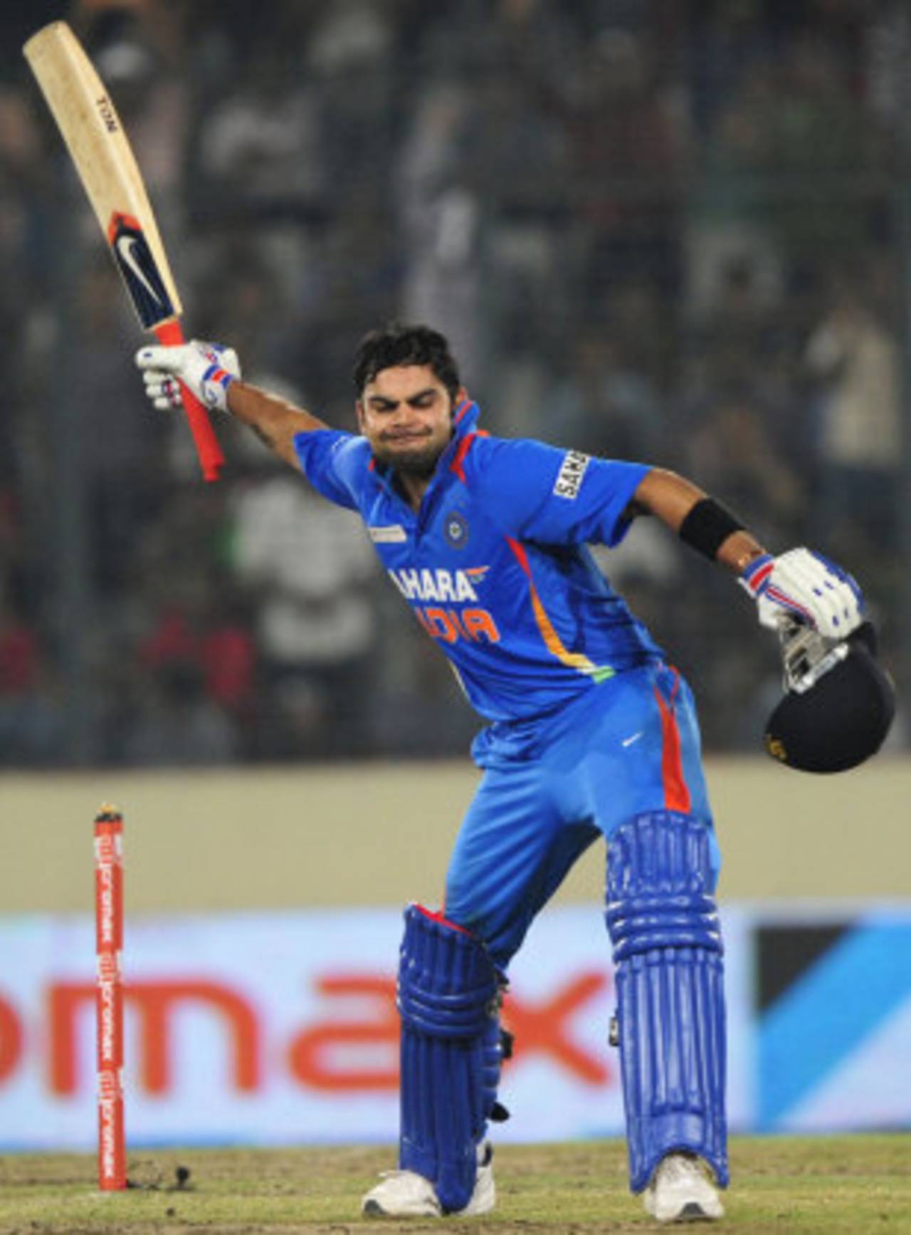 Virat Kohli is pumped up after reaching his third hundred in four ODIs, India v Pakistan, Asia Cup, Mirpur, March 18, 2012