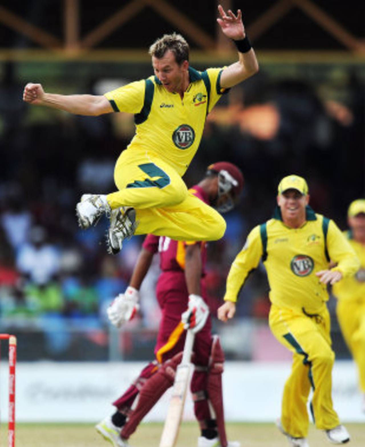 Brett Lee clicks his heels after taking a wicket with the first ball of the innings, West Indies v Australia, 2nd ODI, St Vincent, March 18, 2012