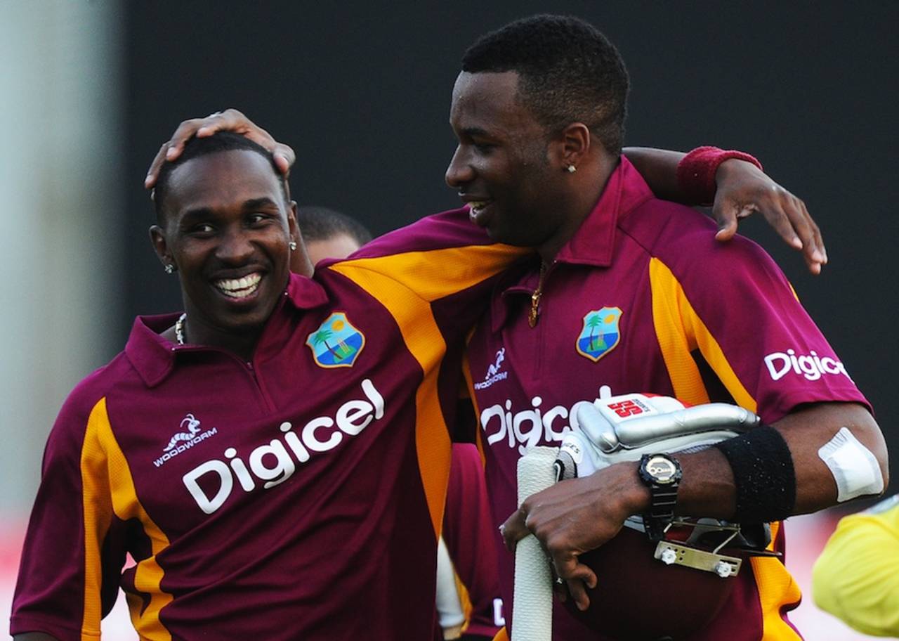 Kieron Pollard and Dwayne Bravo celebrate the victory, West Indies v Australia, 2nd ODI, St Vincent, March 18, 2012