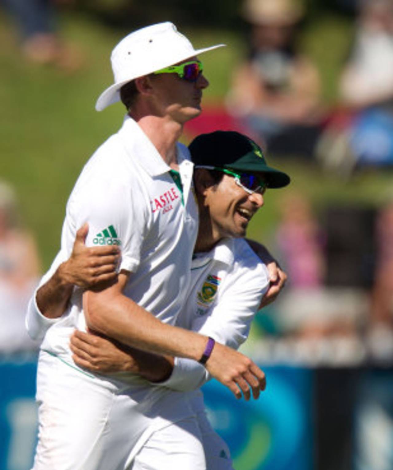 Dale Steyn gets a hug from Imran Tahir after completing a catch, New Zealand v South Africa, 3rd Test, Wellington, 4th day, March 26, 2012