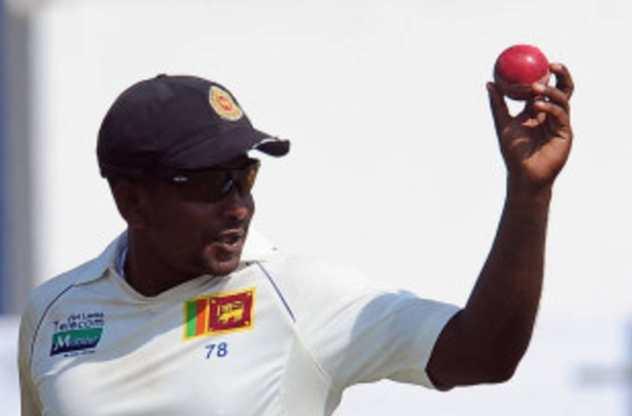 Rangana Herath took his eighth five-for in Test cricket, Sri Lanka v England, 1st Test, Galle, 2nd day, March 27, 2012