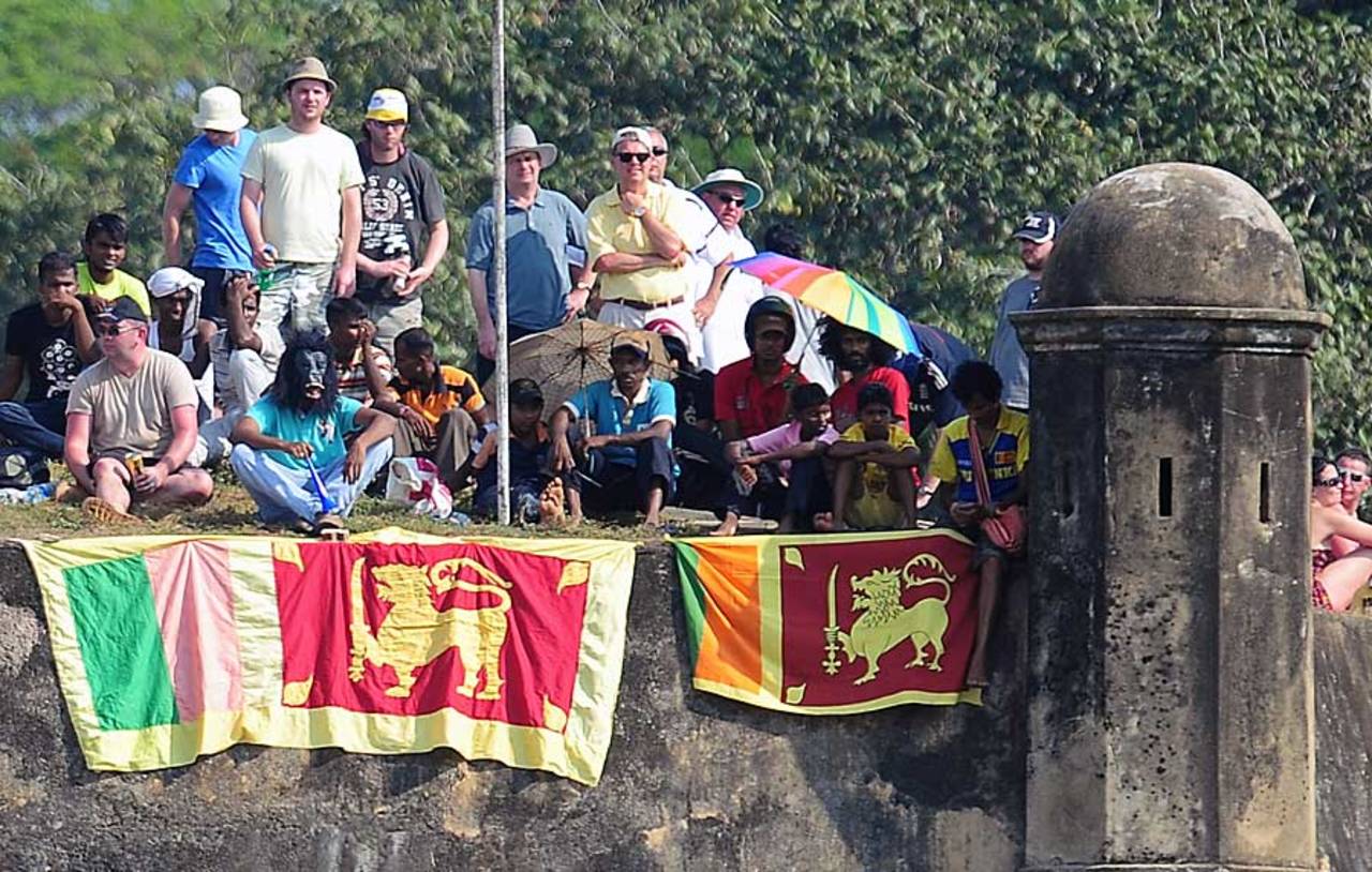Fans watch the action from the ramparts of the Galle fort, Sri Lanka v England, 1st Test, Galle, 3rd day, March 28, 2012