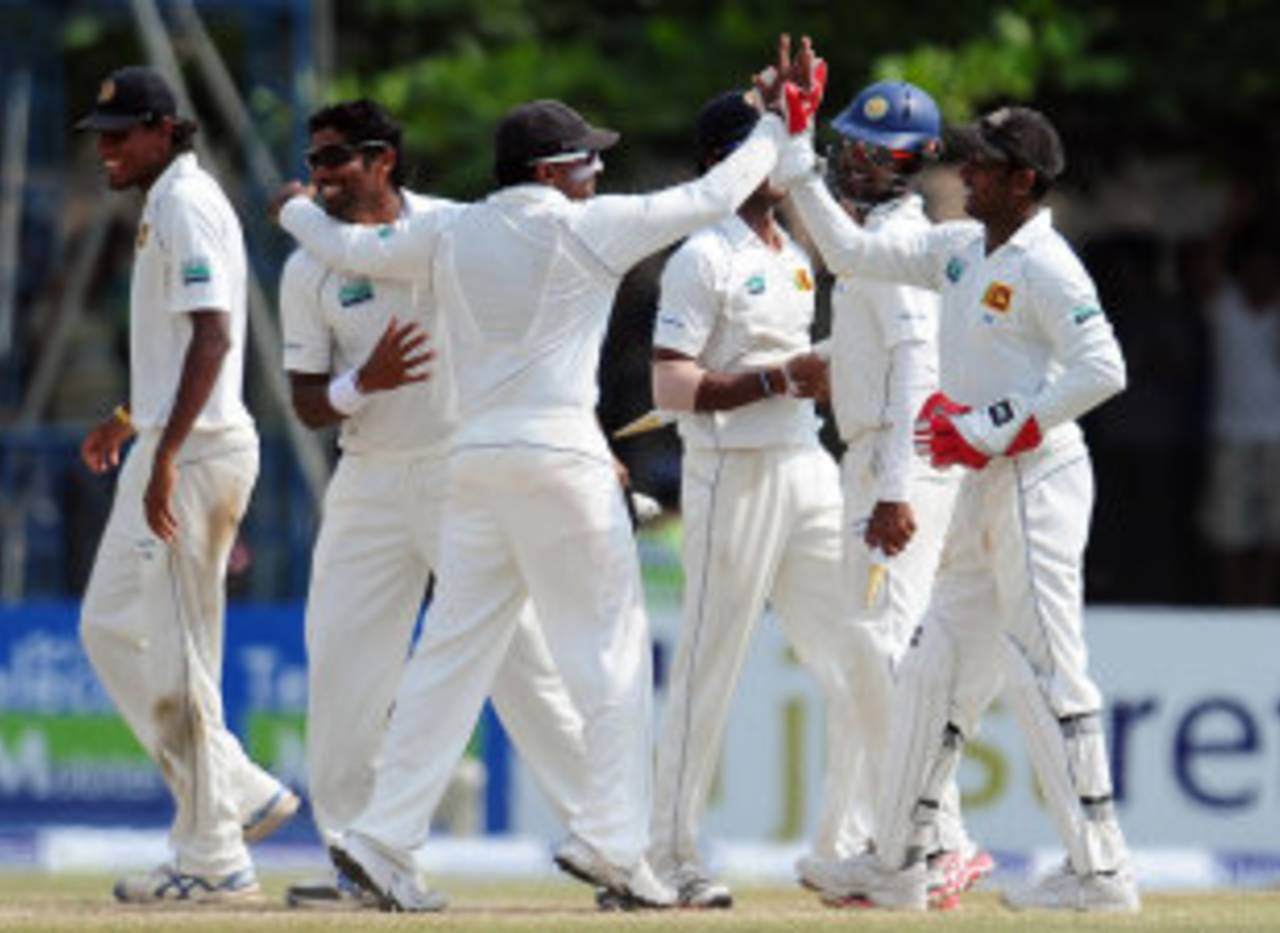 Mahela Jayawardene high-fives his namesake Prasanna as Sri Lanka celebrate their 75-run victory, Sri Lanka v England, 1st Test, Galle, 4th day, March 29, 2012
