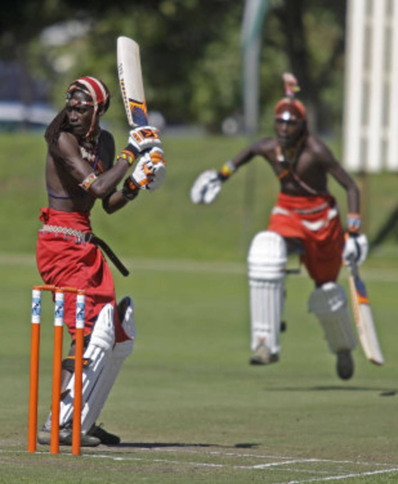 Mulinge Ole Meshame, a Maasai Warrior from the Laikipia region in Kenya, has a bat, Cape Town, March 31, 2012