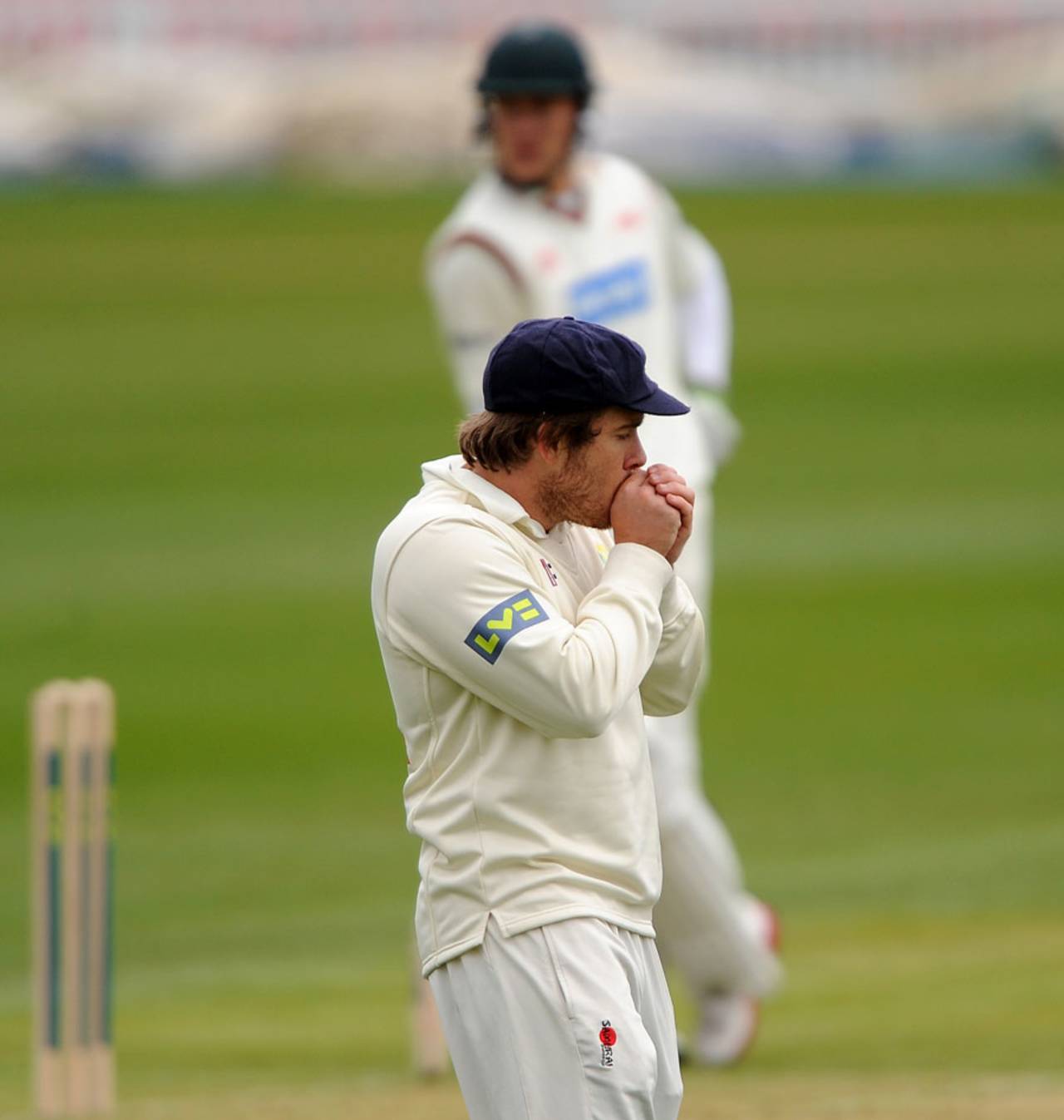 William Bragg blows on his hands whilst fielding, Leicestershire v Glamorgan, County Championship, Leicester, Grace Road, 1st day, March 5, 2012