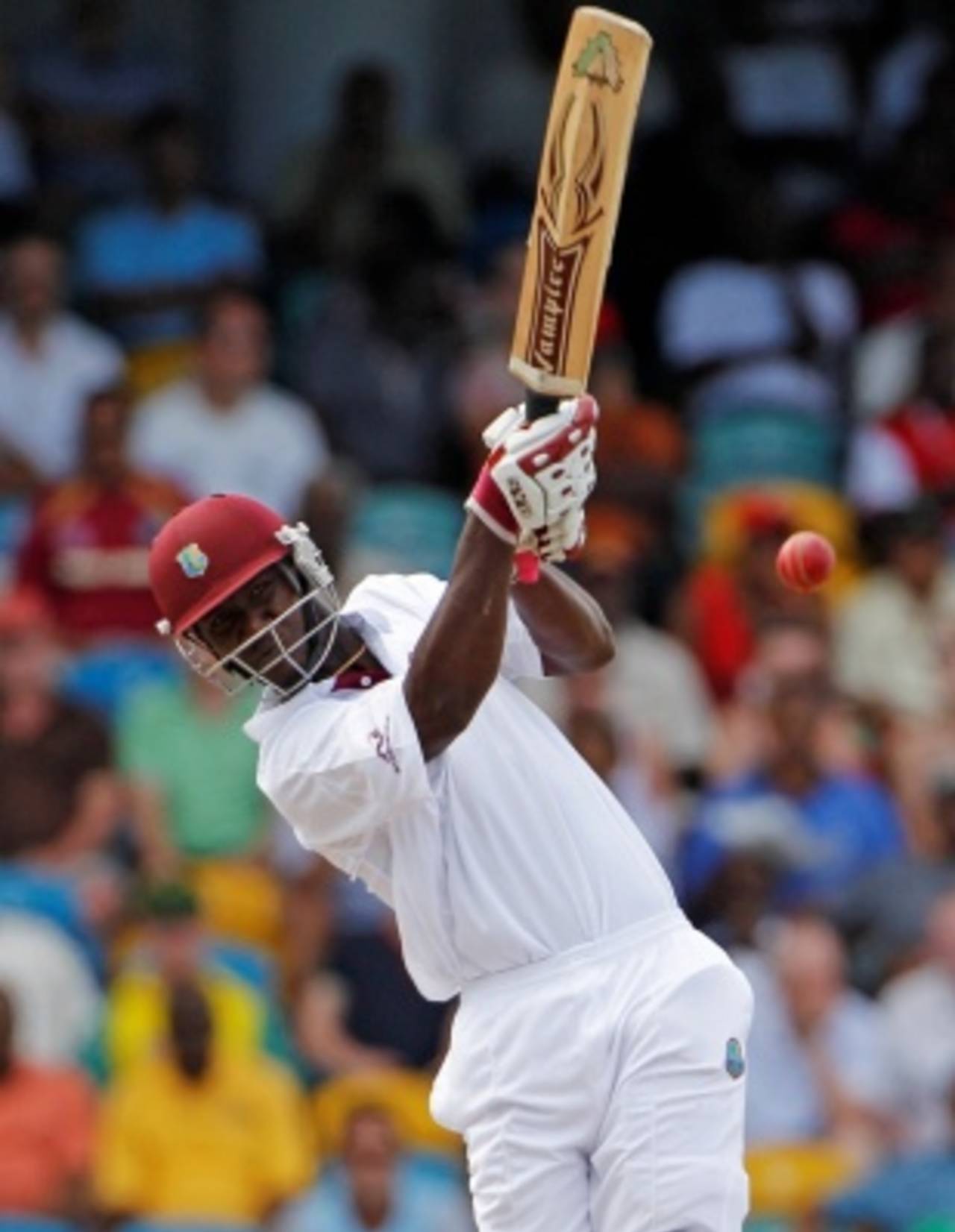 Darren Sammy drives down the ground for six, West Indies v Australia, 1st Test, Barbados, 2nd day, April 8, 2012