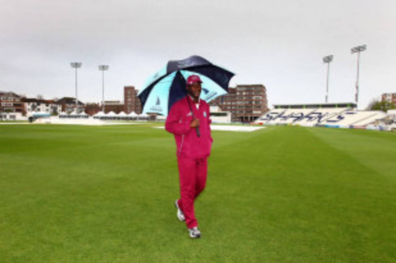 Darren Sammy inspecting the pitch at Hove, where play was abandoned on Saturday&nbsp;&nbsp;&bull;&nbsp;&nbsp;PA Photos