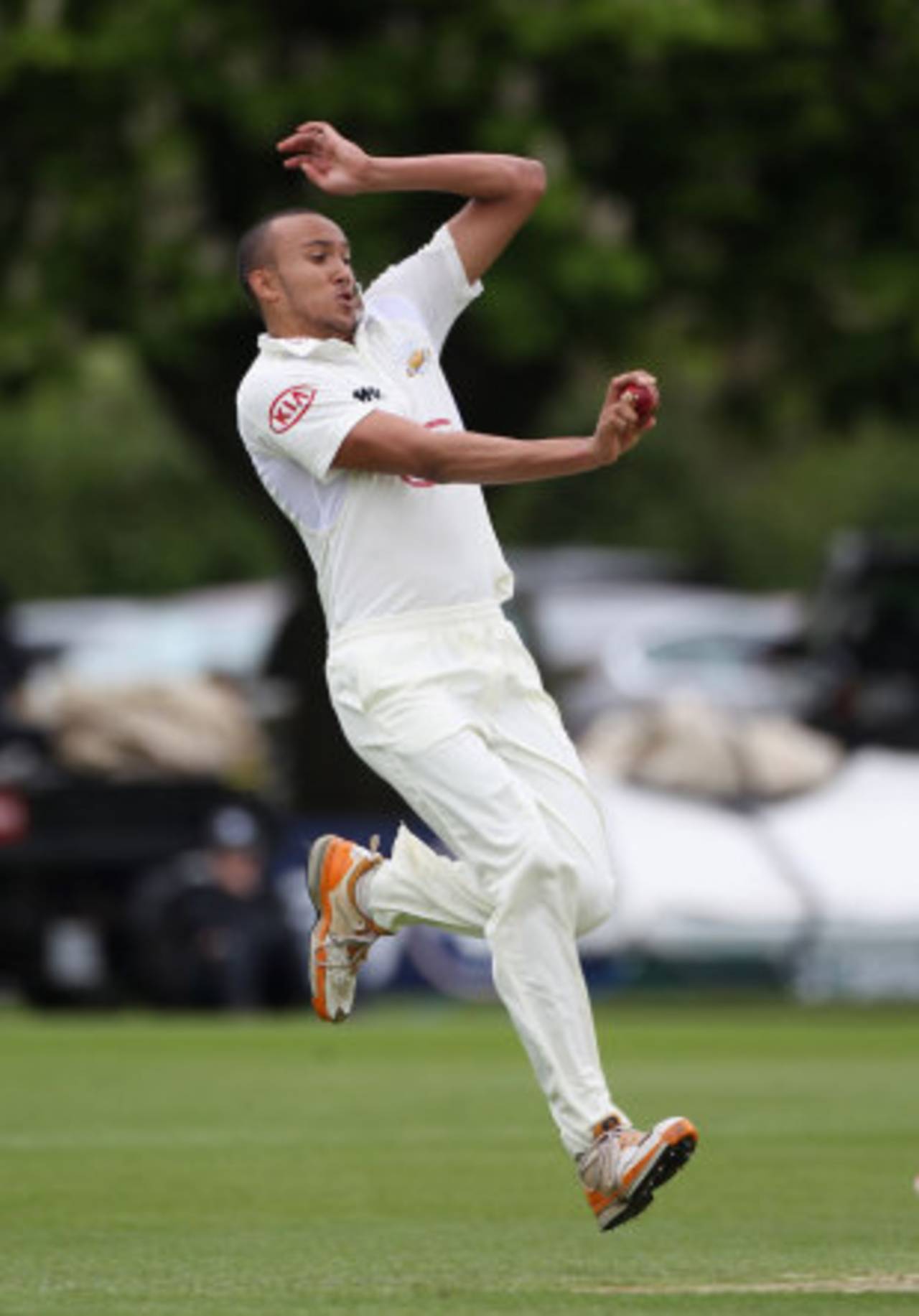 George Edwards bowls for Surrey on his Championship debut&nbsp;&nbsp;&bull;&nbsp;&nbsp;Getty Images