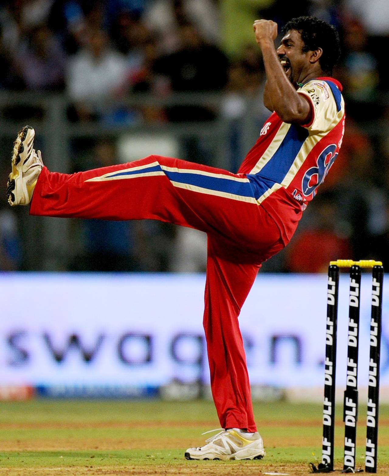 Muttiah Muralitharan exults after taking two wickets in two balls, Mumbai Indians v Royal Challengers Bangalore, Mumbai, IPL, May 9, 2012 