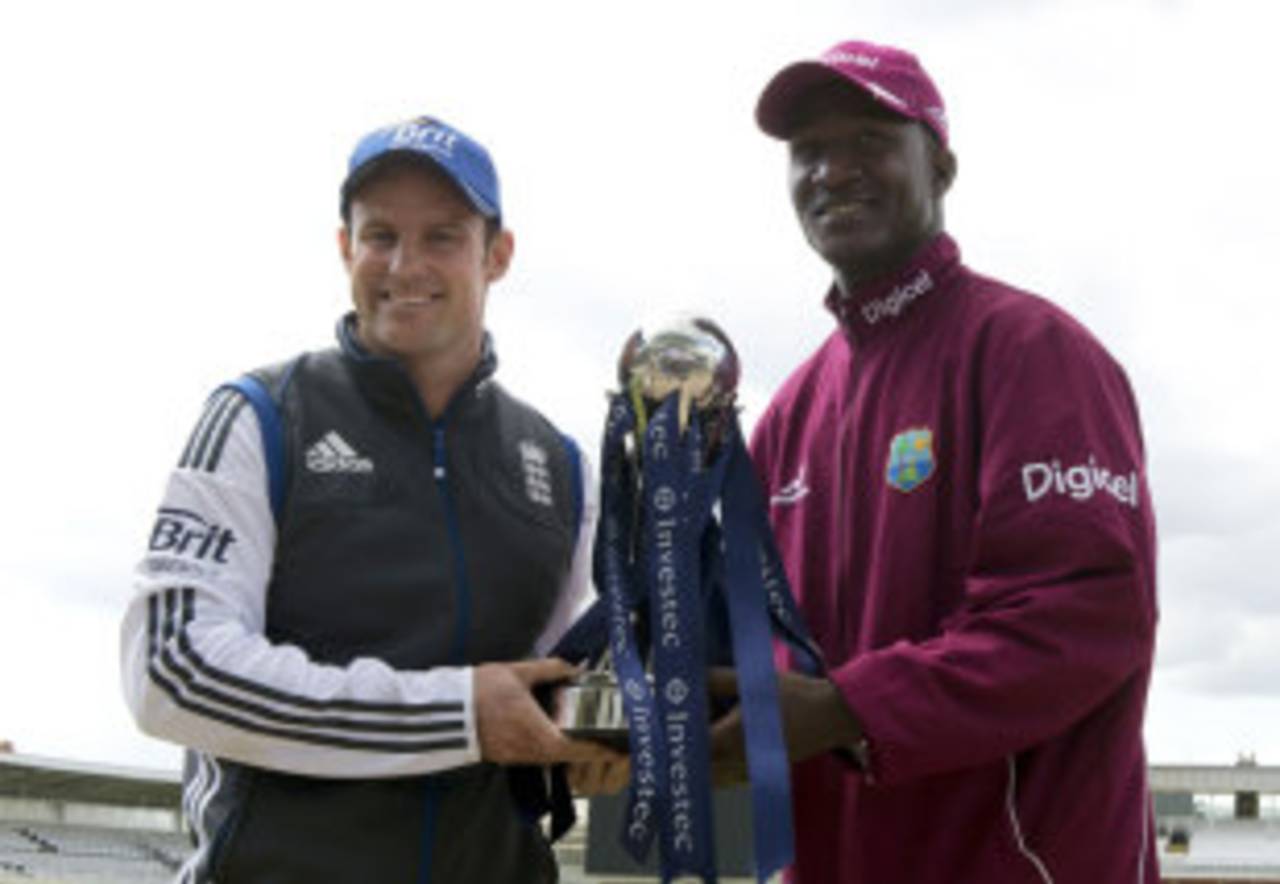 Captains Andrew Strauss and Darren Sammy pose with the series trophy ahead of the first Test between England and West Indies, Lord's, May 16, 2012