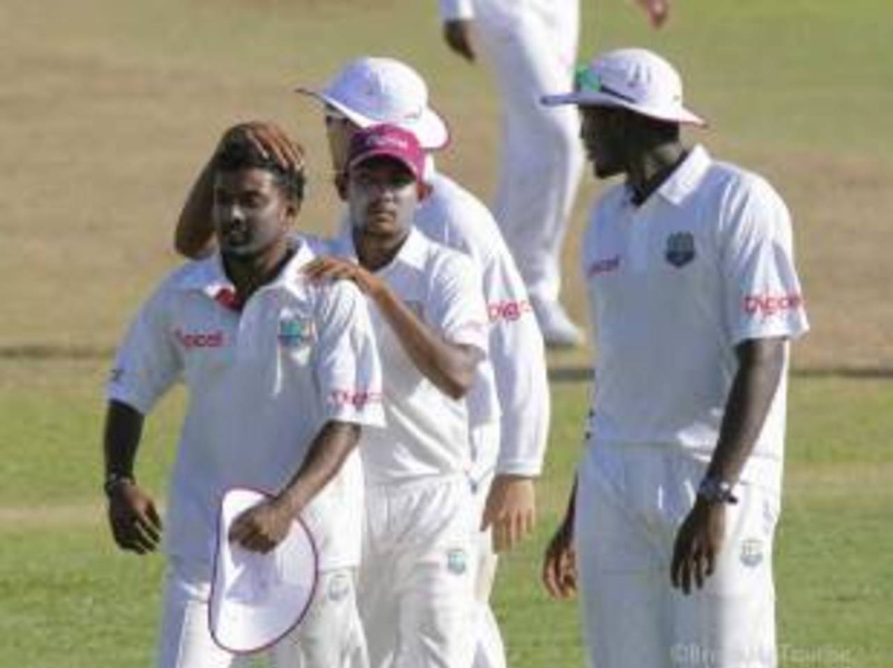 Veerasammy Permaul is congratulated by Devendra Bishoo, West Indies A v India A, 2nd unofficial Test, St Vincent, 2nd day, June 10, 2012