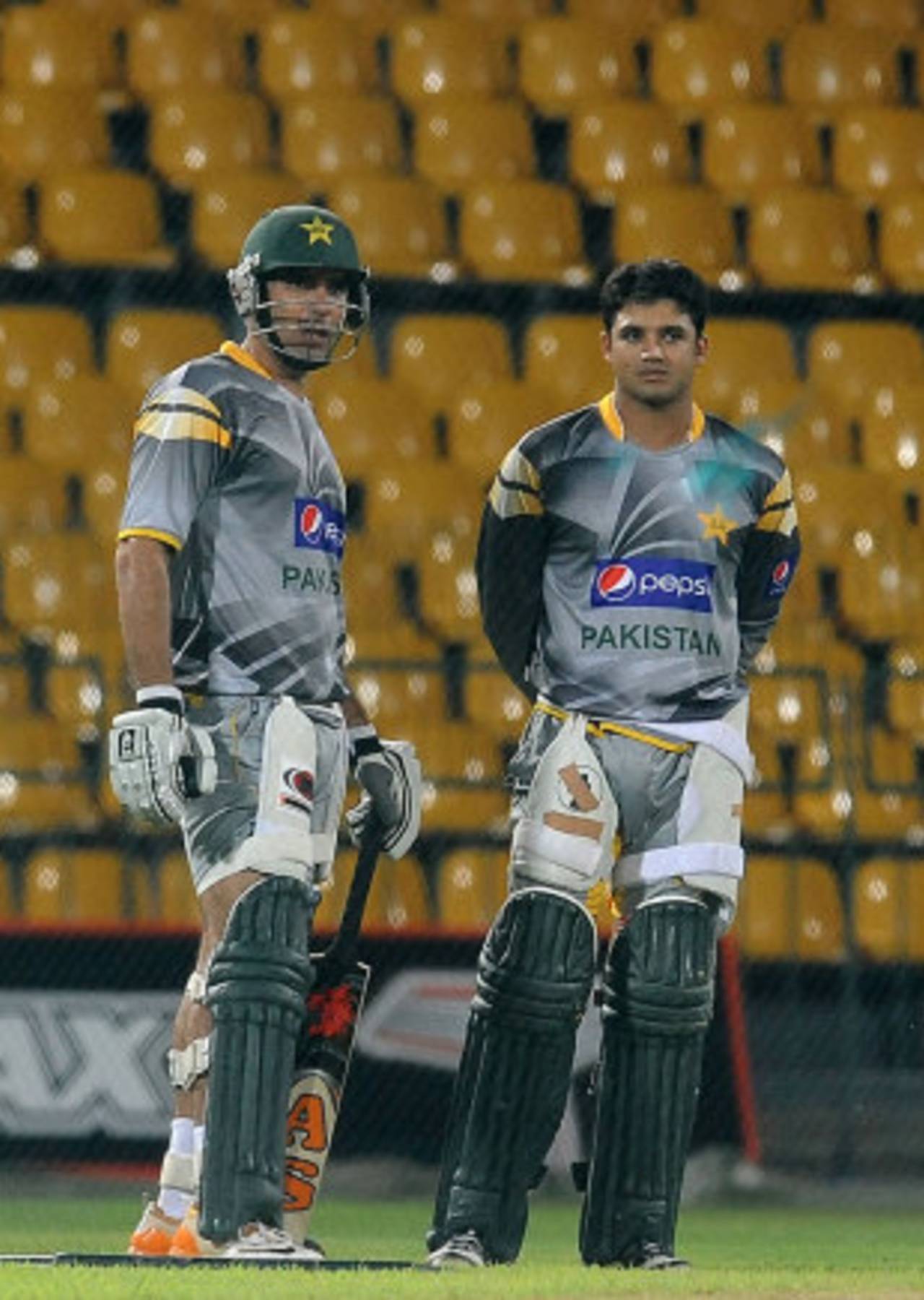 Misbah-ul-Haq and Azhar Ali have a chat during practice, Colombo, June 12, 2012