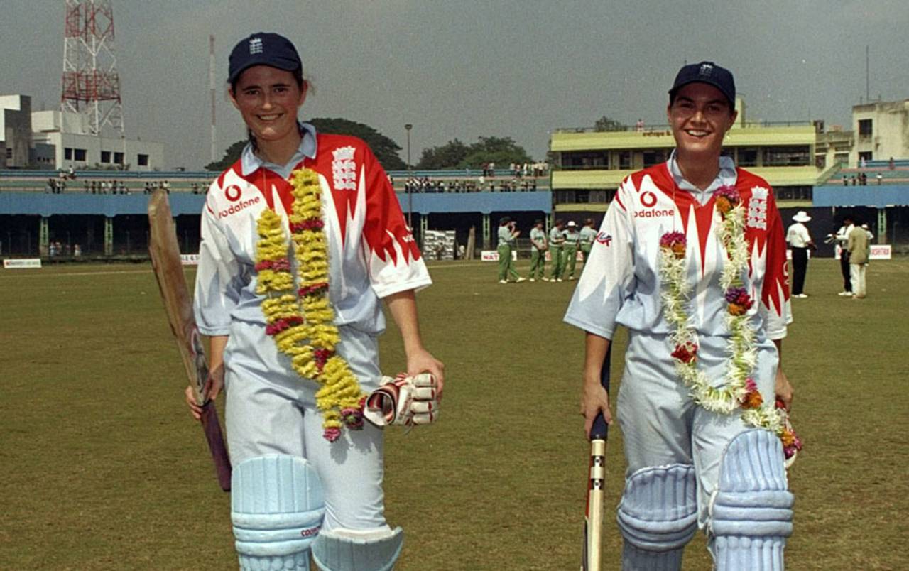 Charlotte Edwards and Jane Smit walk back after unbeaten 131-run stand, England v Ireland, women's World Cup, Poona, December 16, 1997