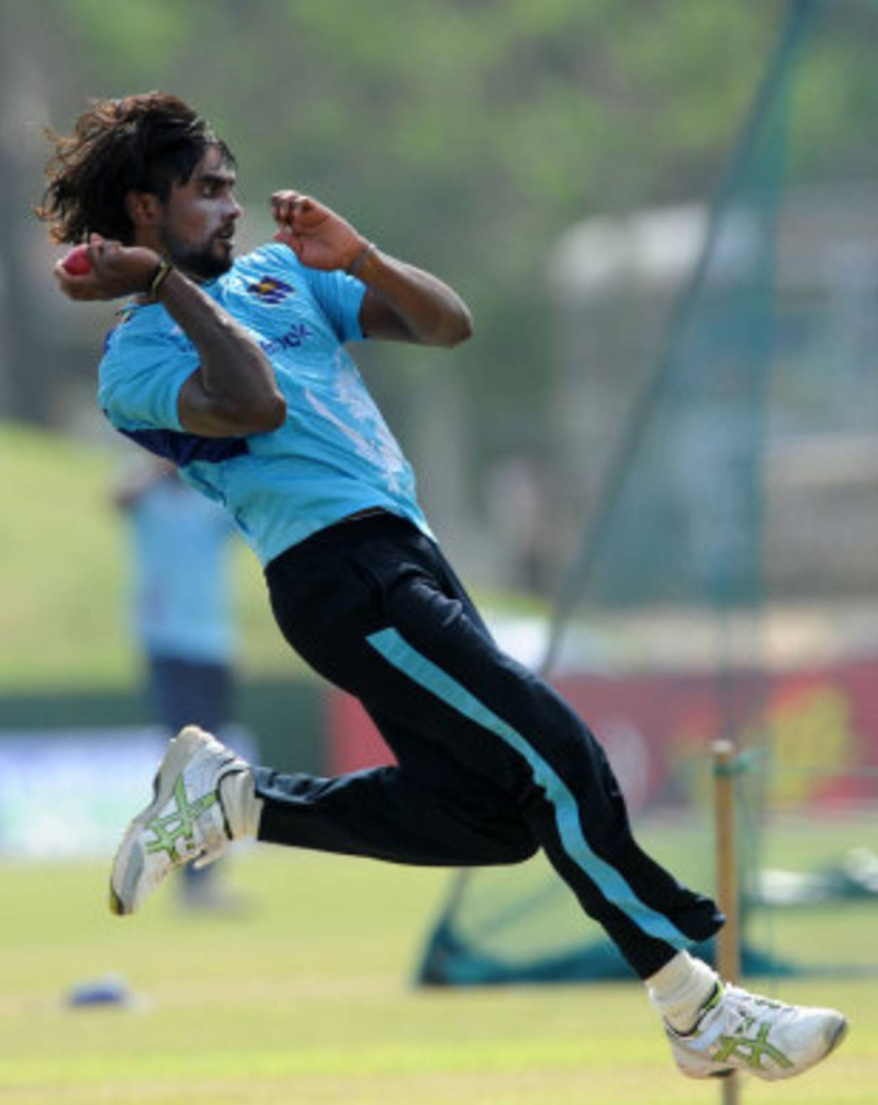 Nuwan Pradeep runs in to bowl, Galle, June 20, 2012