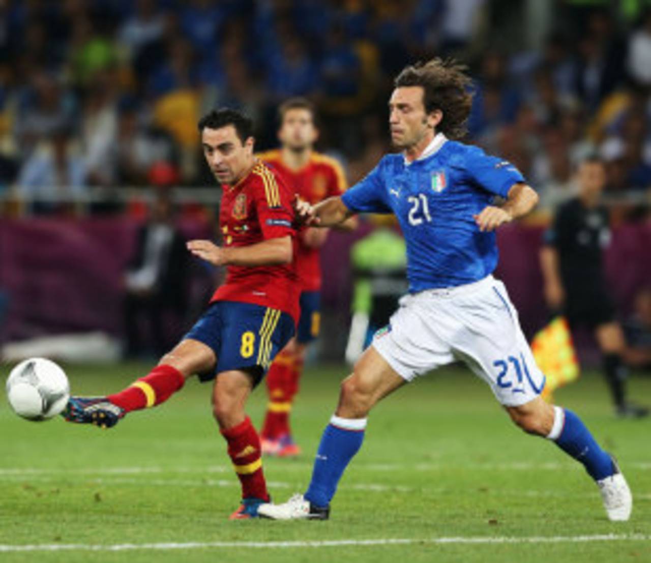 Andrea Pirlo tries to tackle Xavi Hernandez, Italy v Spain, Euro 2012 final, Kiev, July 1, 2012