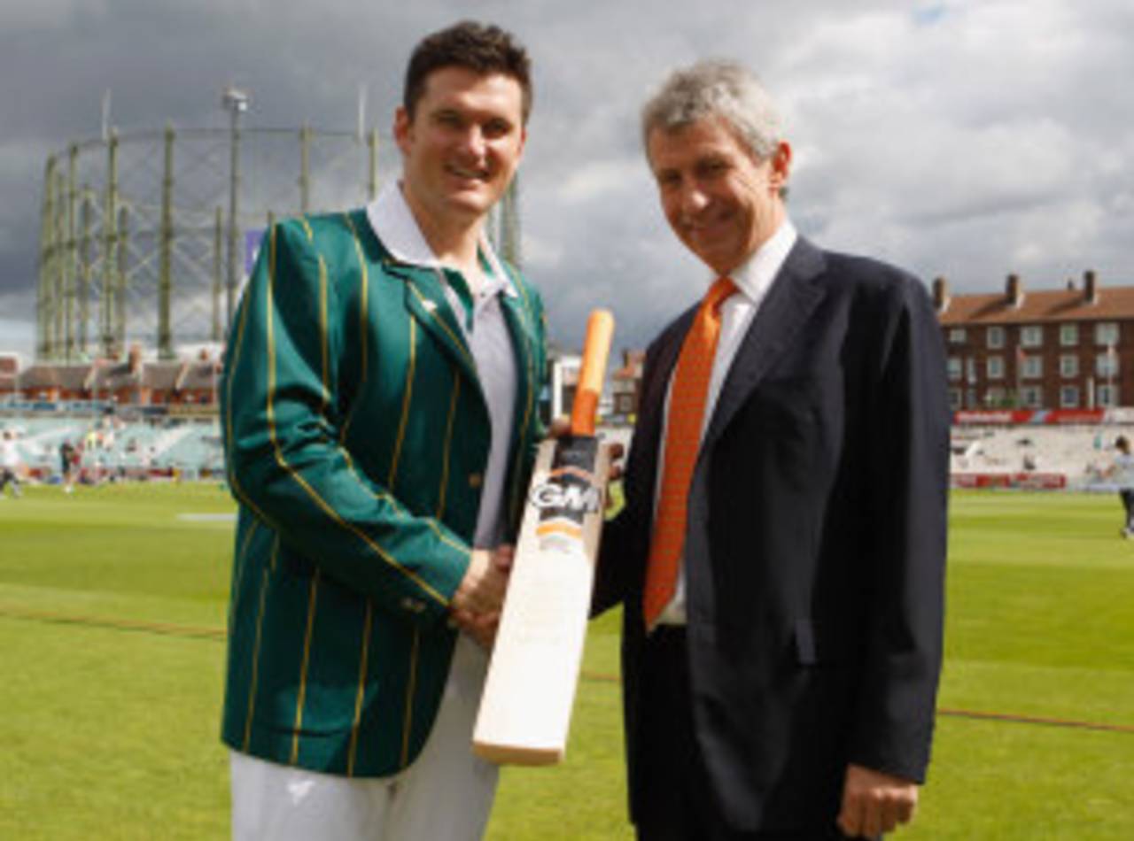 Graeme Smith is presented with a bat to mark his 100th Test, England v South Africa, 1st Investec Test, The Oval, 1st day, July 19, 2012