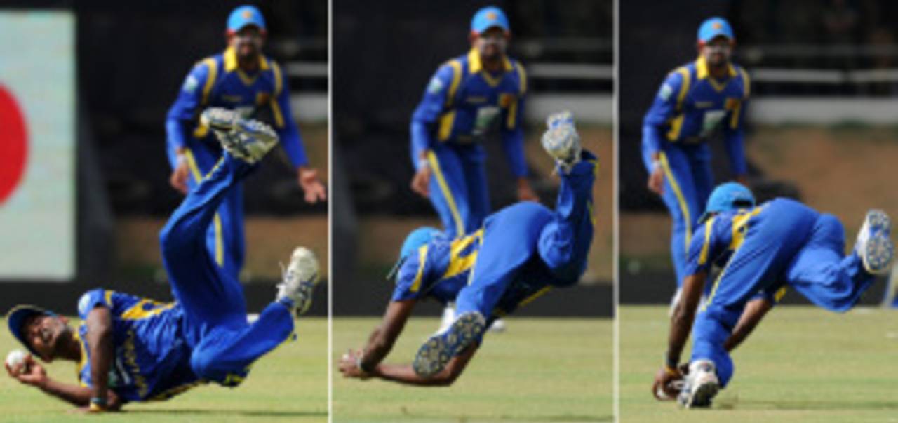 Nuwan Kulasekara attempts to dismiss Virender Sehwag by taking a tumbling catch, Sri Lanka v India, 1st ODI, Hambantota, July 21, 2012
