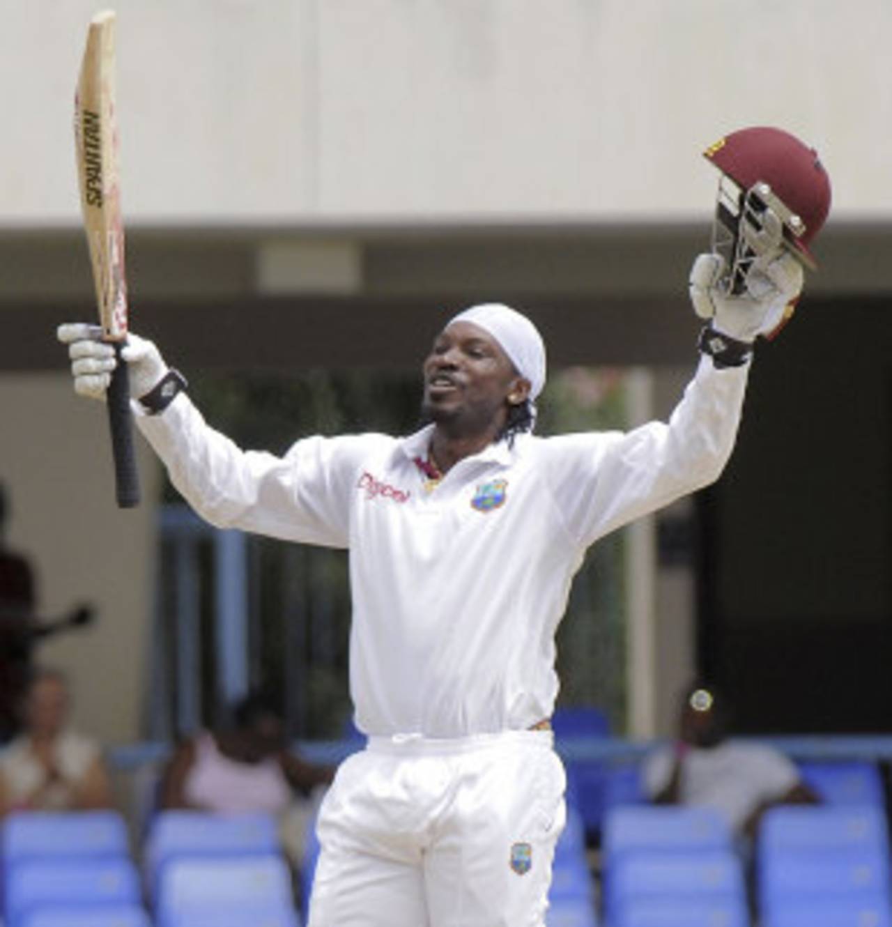 Chris Gayle celebrates his century in his first innings after returning to the West Indies side&nbsp;&nbsp;&bull;&nbsp;&nbsp;DigicelCricket.com/Brooks LaTouche Photography