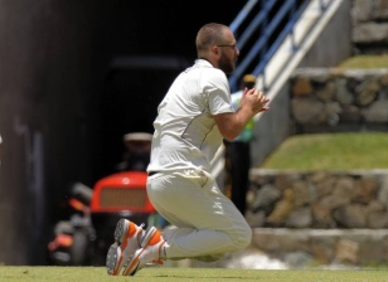Daniel Vettori clings into a caught-and-bowled chance for his only wicket in Antigua&nbsp;&nbsp;&bull;&nbsp;&nbsp;DigicelCricket.com/Brooks LaTouche Photography