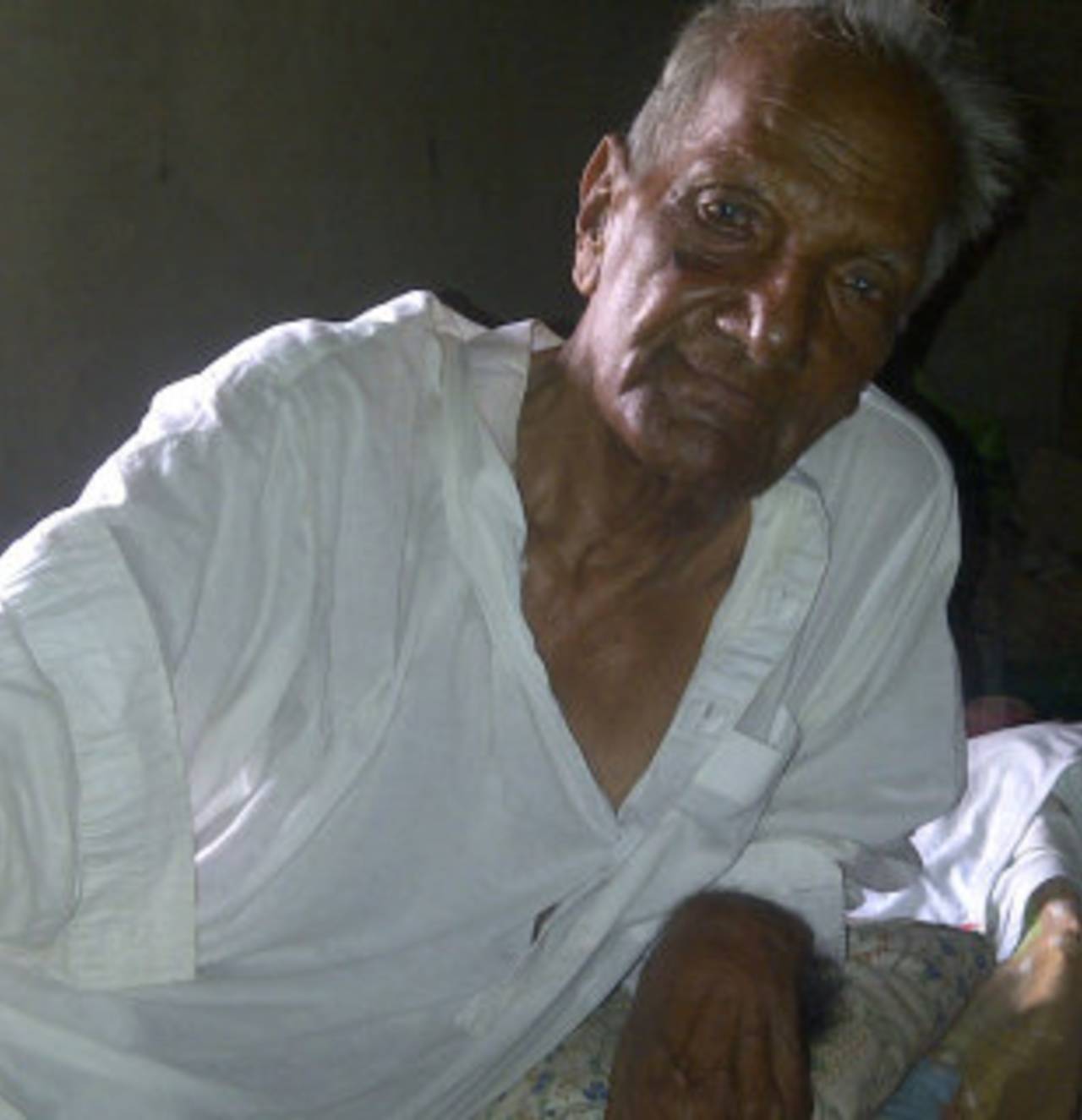 The 85-year-old Israr Ali, Pakistan's oldest living Test cricketer, at his home in Okara, Pakistan, July 2012
