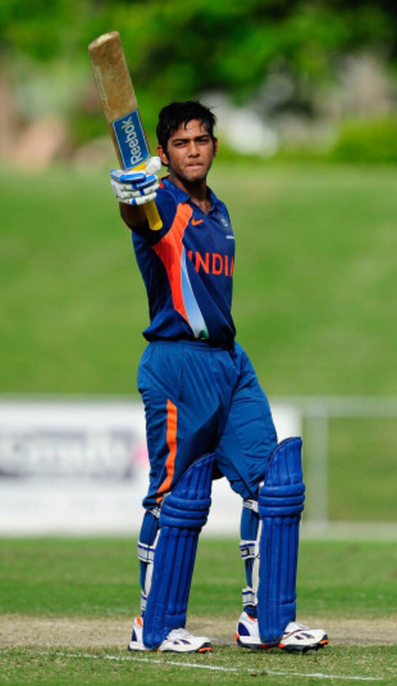 Unmukt Chand raises his bat after scoring a century, Australia v India, Quadrangular U-19 Series final, Townsville, April 15, 2012