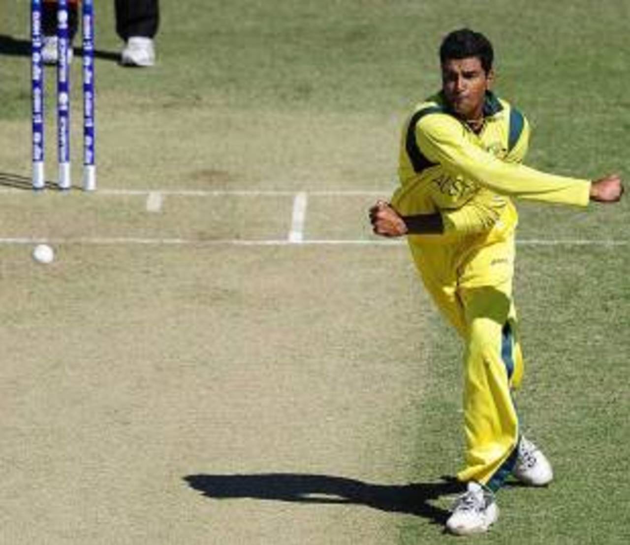 Gurinder Sandhu throws one hard down the pitch, Australia v Nepal, Group A, ICC Under-19 World Cup 2012, Townsville, August 13, 2012