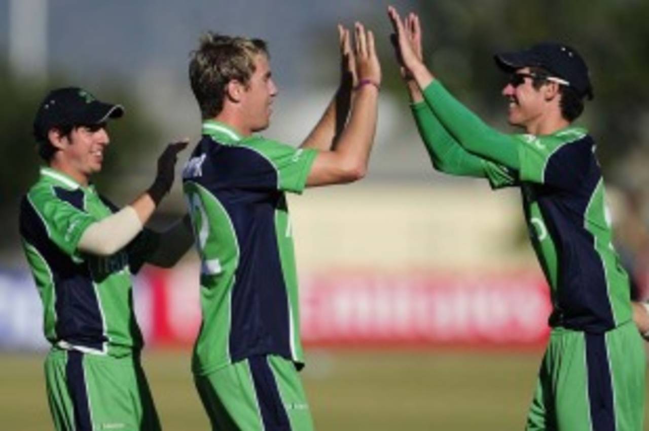 Graeme McCarter and George Dockrell celebrate a wicket, Ireland v Nepal, ICC Under-19 World Cup, Group A, Townsville, August 15, 2012