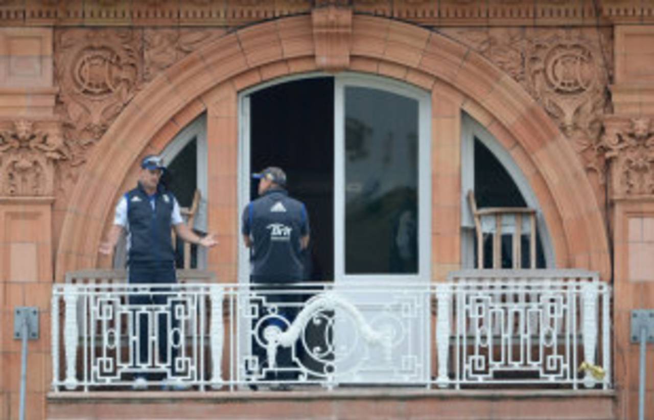 Andrew Strauss surveys the scene from the Lord's balcony with England's director of cricket, Andy Flower, ahead of his 100th Test, but it was not the perfect scene he would have liked to see&nbsp;&nbsp;&bull;&nbsp;&nbsp;Getty Images