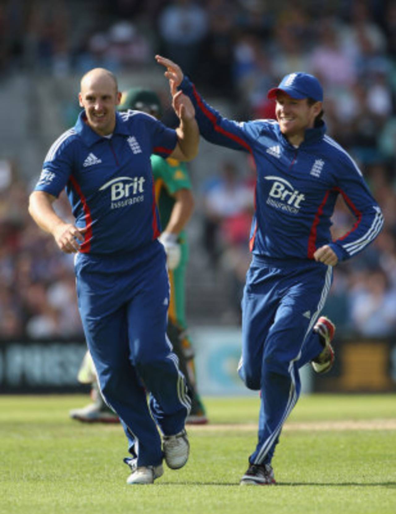 James Tredwell celebrates a wicket with Eoin Morgan, England v South Africa, 3rd NatWest ODI, The Oval, August 31, 2012