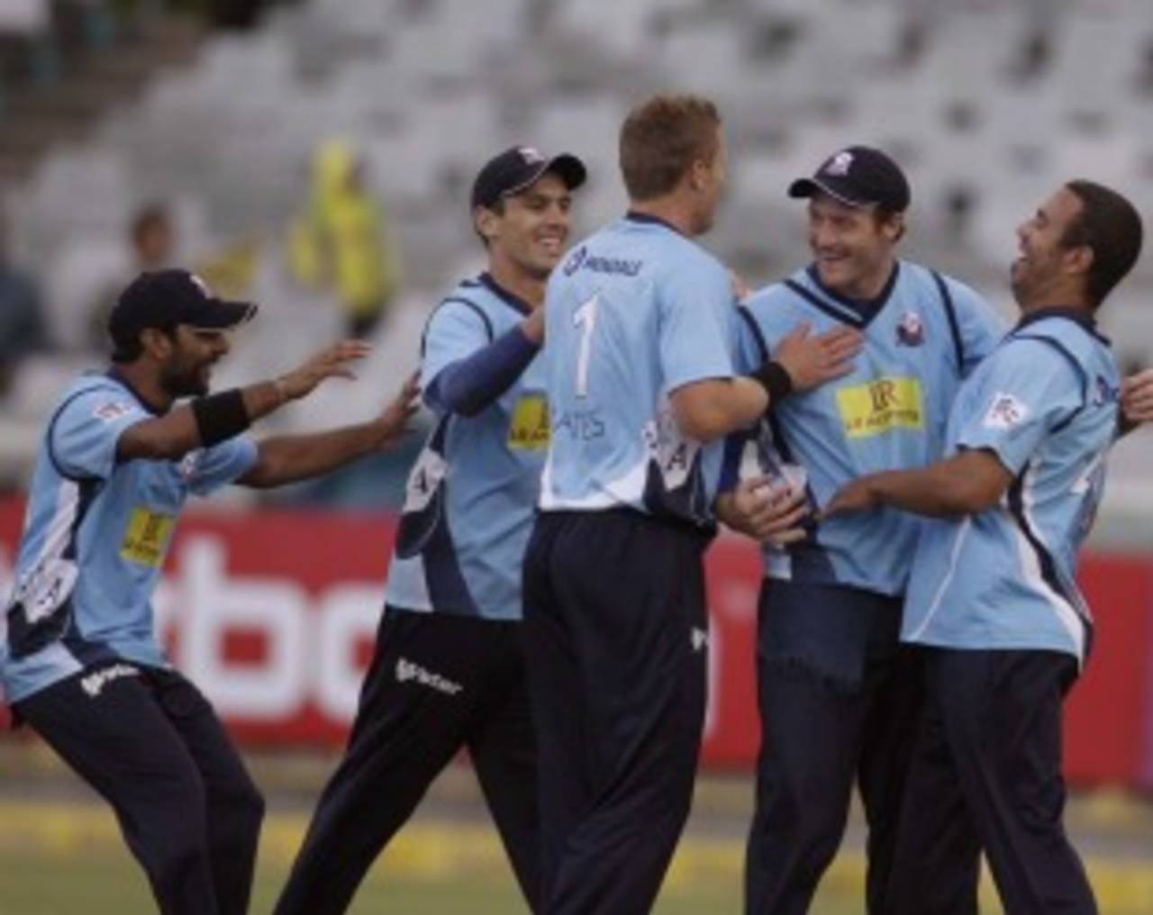 Martin Guptill is congratulated by his team-mates after he took a catch to dismiss Gautam Gambhir, Auckland v Kolkata Knight Riders, Group A, Champions League Twenty20, Cape Town, October 15, 2012