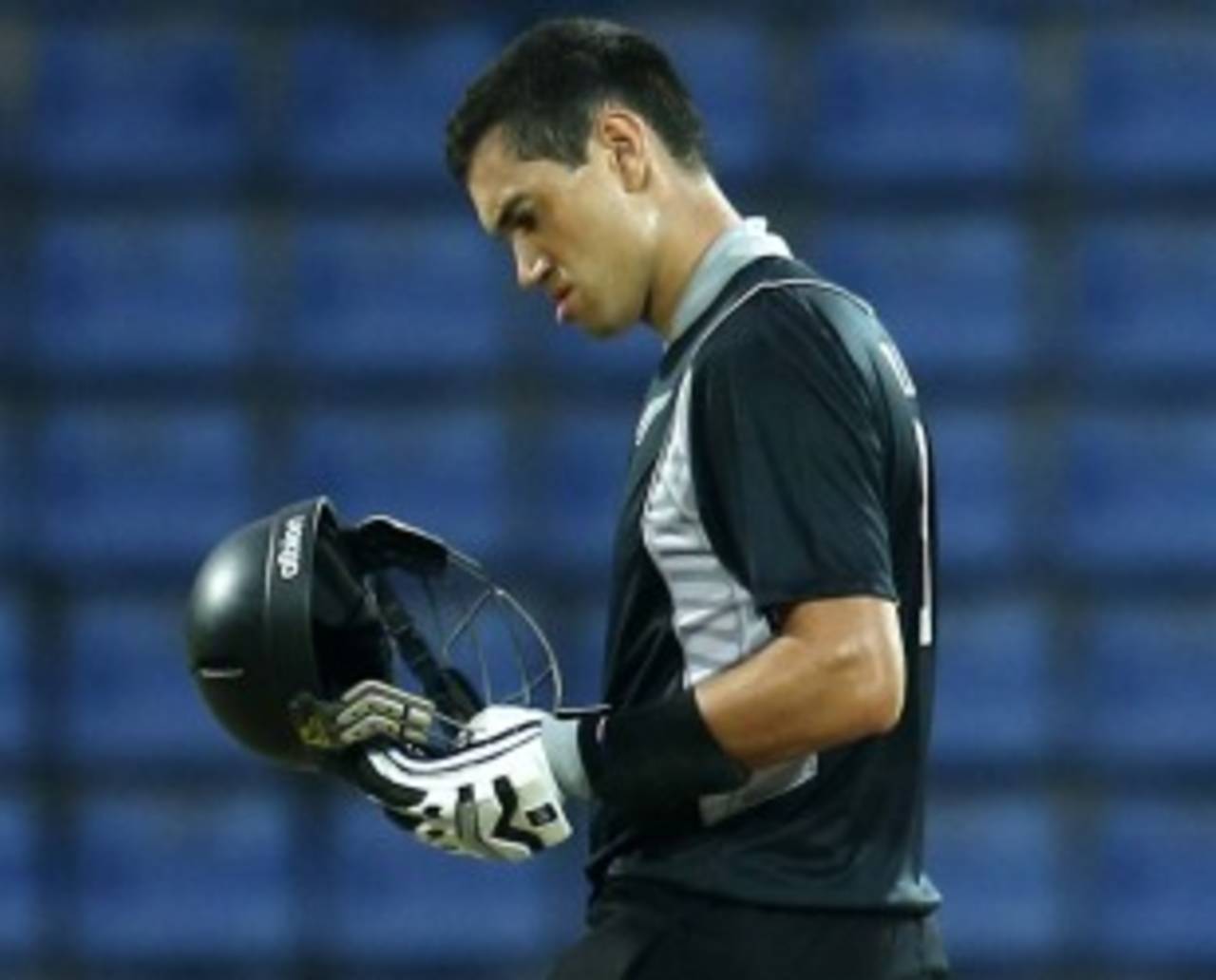 Ross Taylor checks his helmet after being hit by Lasith Malinga, Sri Lanka v New Zealand, 2nd ODI, Pallekele, November 4, 2012