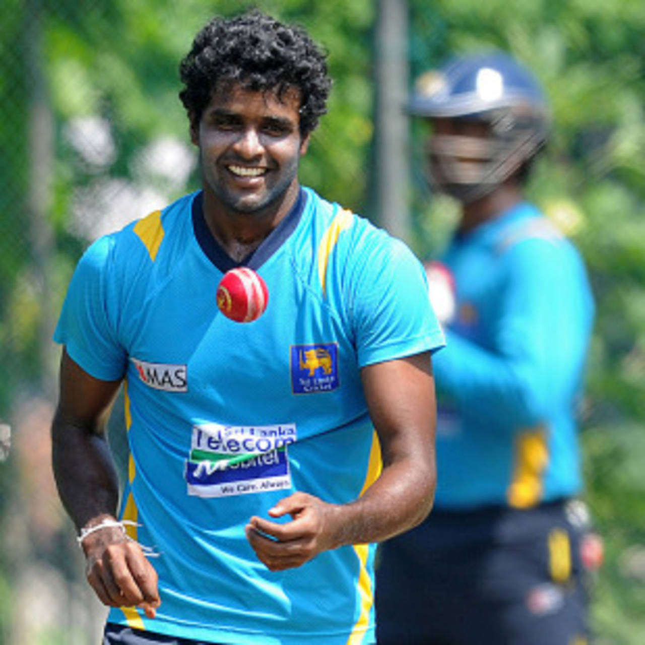 Shaminda Eranga smiles in a training session, Galle, November 16, 2012