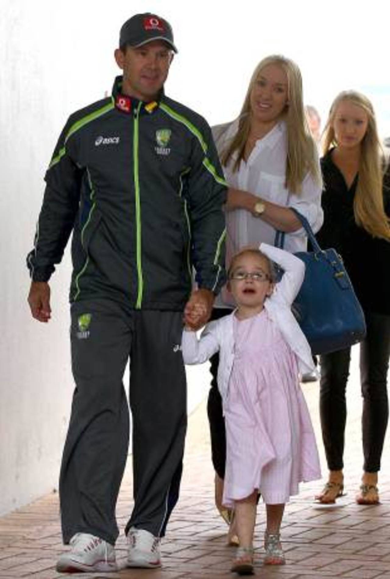Ricky Ponting walks into the WACA gym for his retirement announcement with his family&nbsp;&nbsp;&bull;&nbsp;&nbsp;AFP