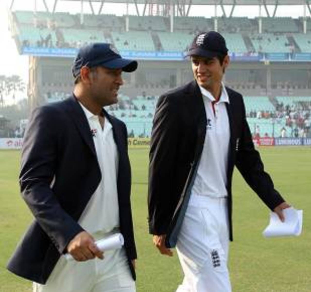 MS Dhoni and Alastair Cook walk out for the toss, India v England, 3rd Test, Kolkata, 1st day, December 5, 2012