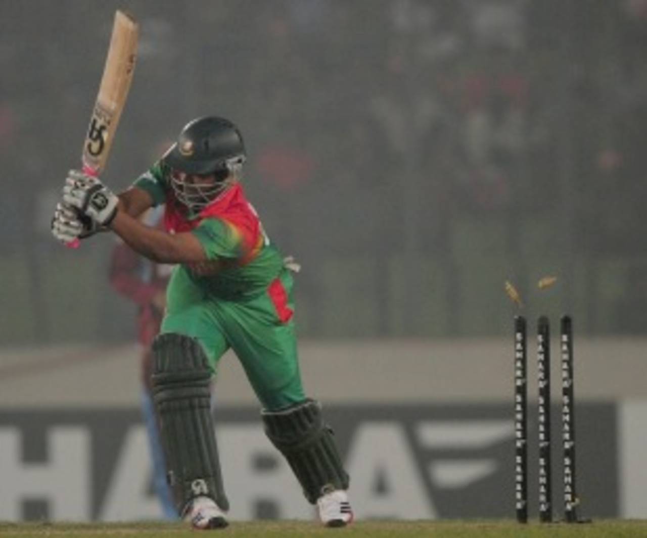 Tamim Iqbal is bowled for 8, Bangladesh v West Indies, 5th ODI, Mirpur, December 8, 2012