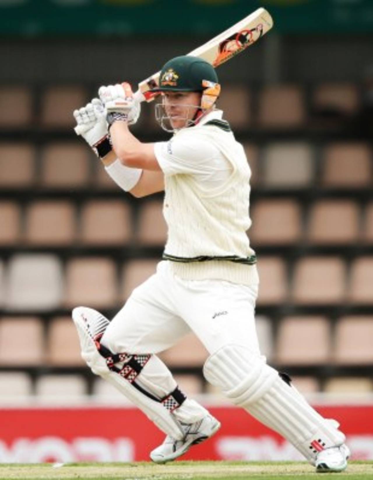 David Warner crunches one through the off side, Australia v Sri Lanka, 1st Test, Hobart, 1st day, December 14, 2012