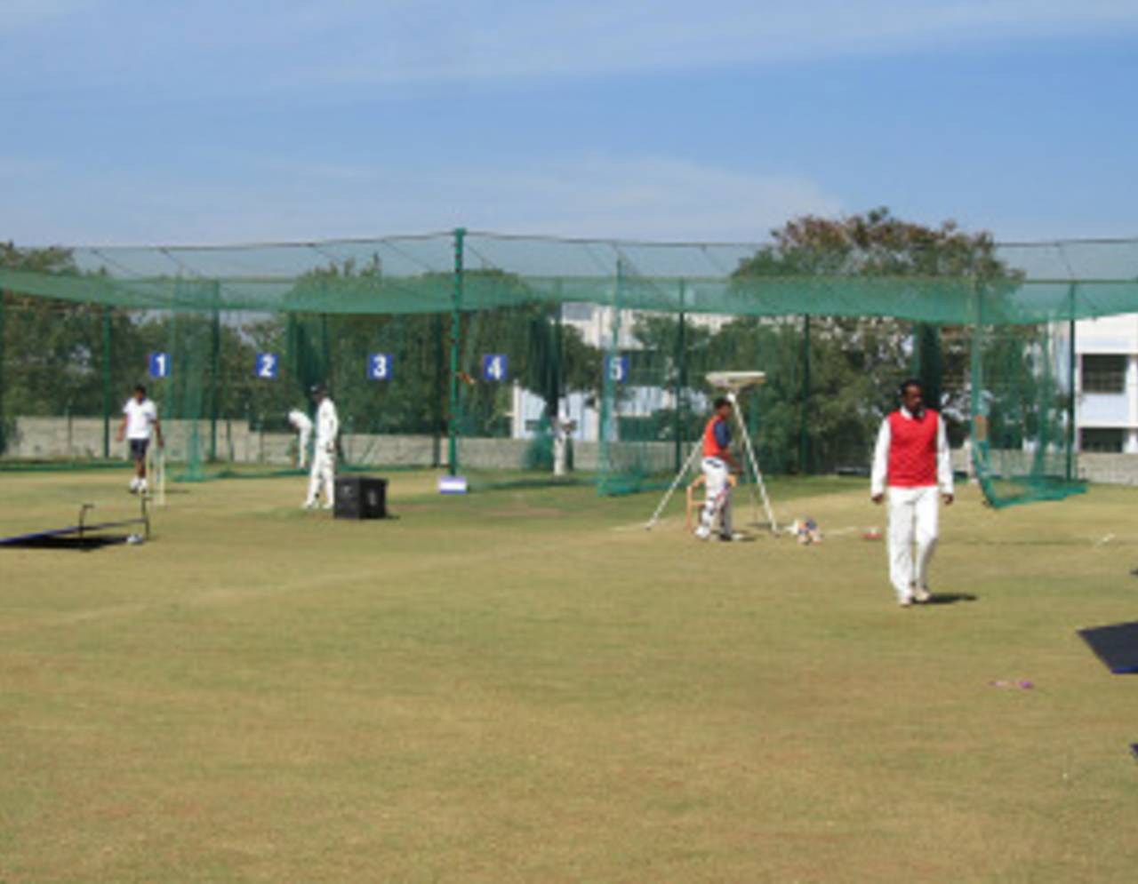 Players practice at the KSCA Academy nets, Karnataka v Haryana, Ranji Trophy 2012-13, Group B, Hubli, 1st day, December 22, 2012