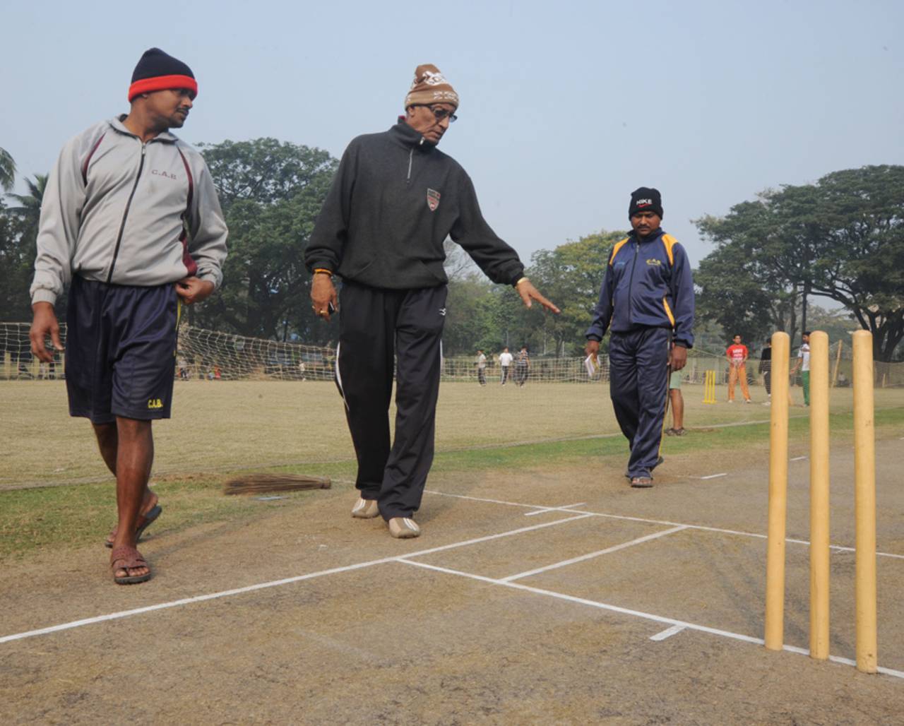 Eden Gardens curator Prabir Mukherjee instructs the groundstaff