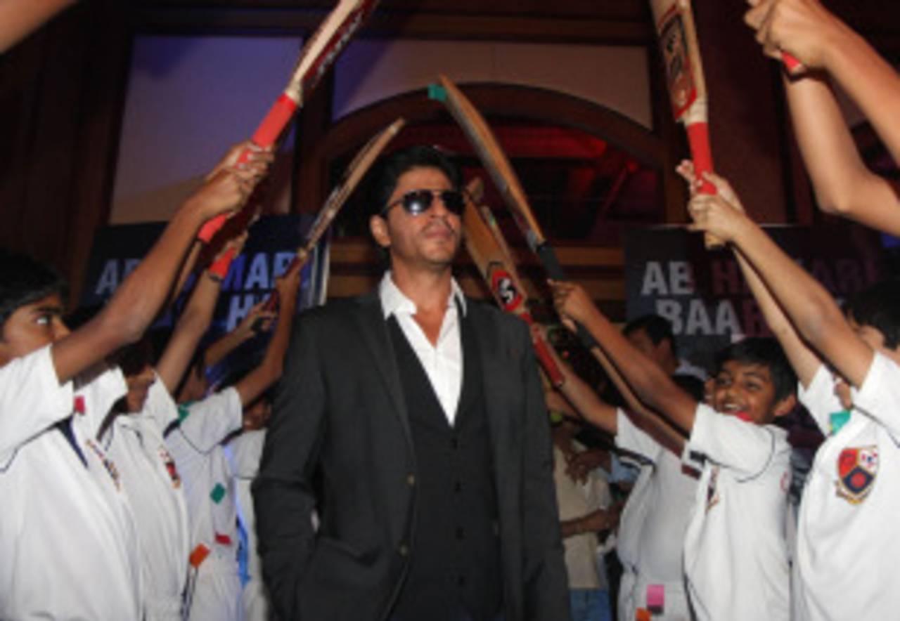 Bollywood actor Shahrukh Khan gets a guard of honour at the launch of the 'Toyota University Cricket Championship', Mumbai, January 17, 2013