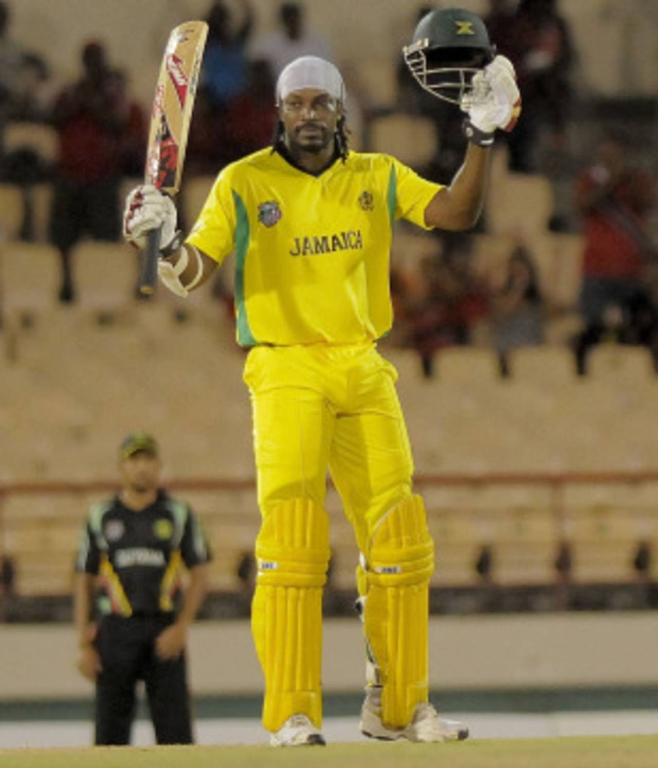 Chris Gayle acknowledges the applause after reaching his century, Jamaica v Guyana, Caribbean T20, playoff, St Lucia, January 19, 2013