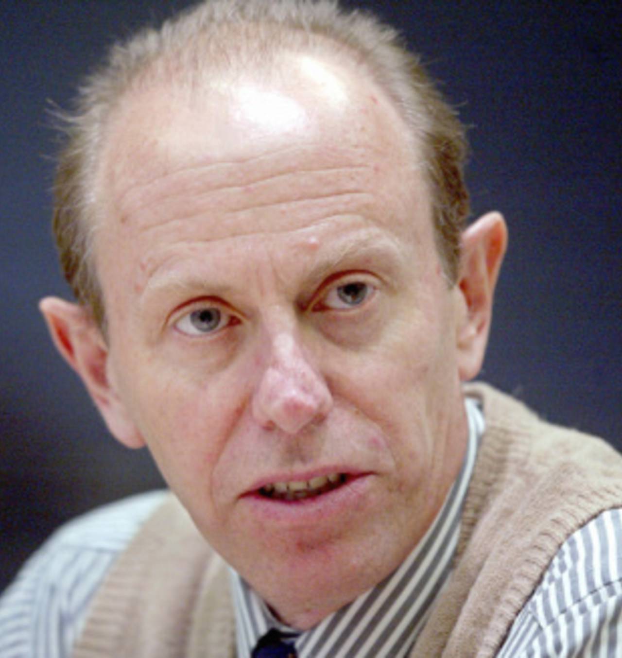 David Coltart of the Movement for Democratic Change talks at a press conference in Berlin, March 19, 2004