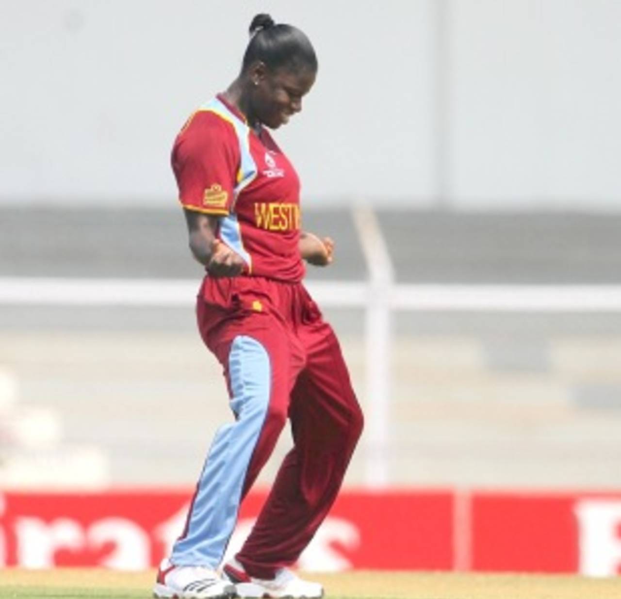 Tremayne Smartt breaks into a dance after picking up a wicket, New Zealand v West Indies, Super Six match, Women's World Cup 2013, Mumbai,  February 11, 2013