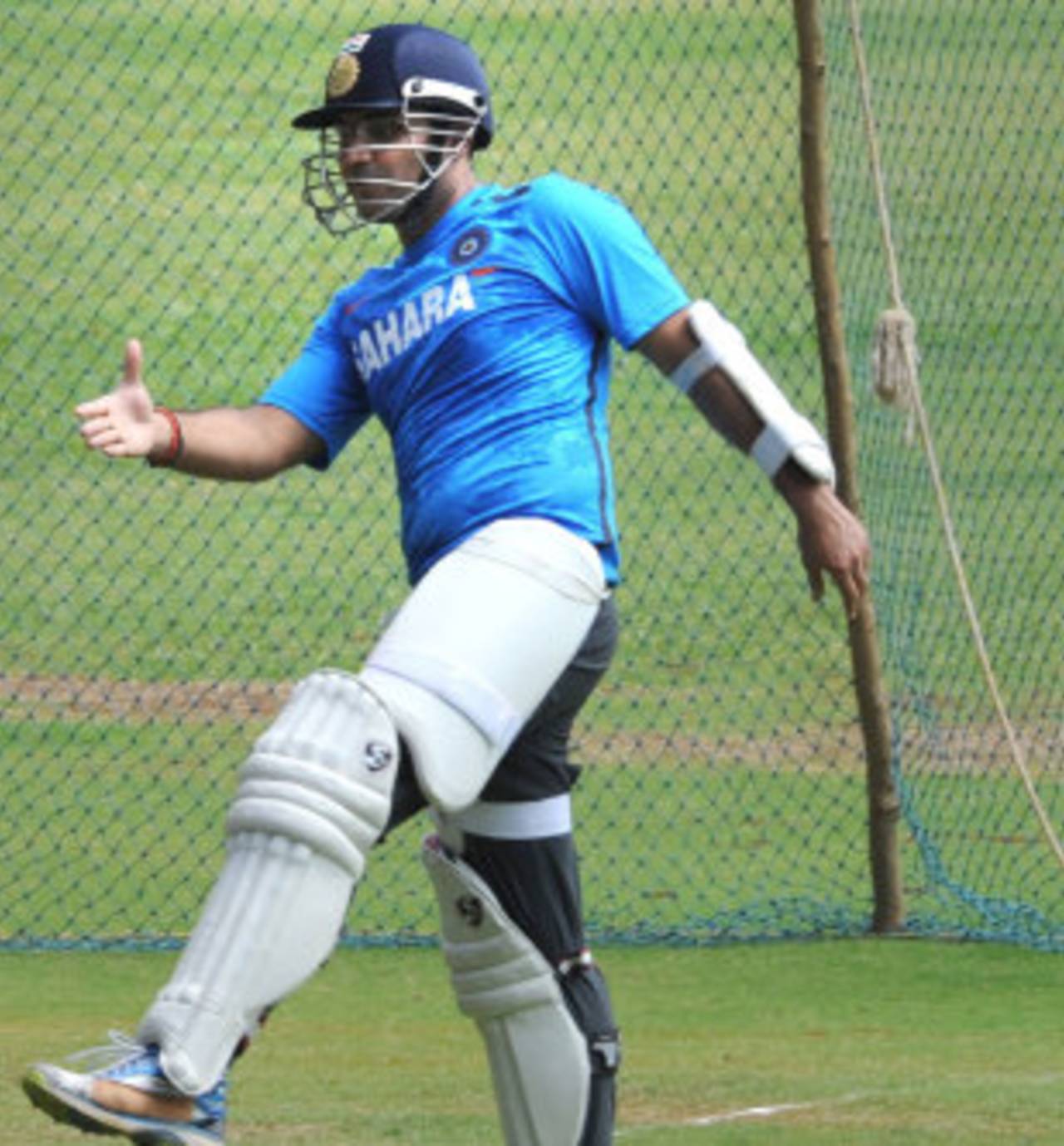 Virender Sehwag, in his new spectacles, trains at India's conditioning camp in Bangalore, February 17, 2013