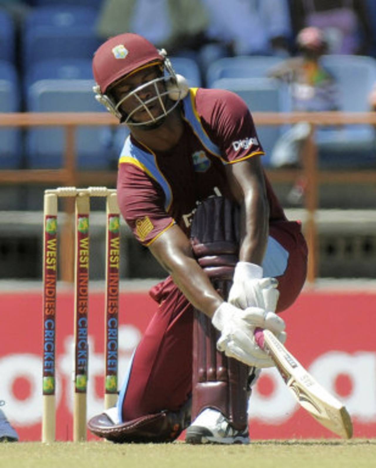Johnson Charles is hit by the ball while attempting a sweep, West Indies v Zimbabwe, 1st ODI, Grenada, February 22, 2013