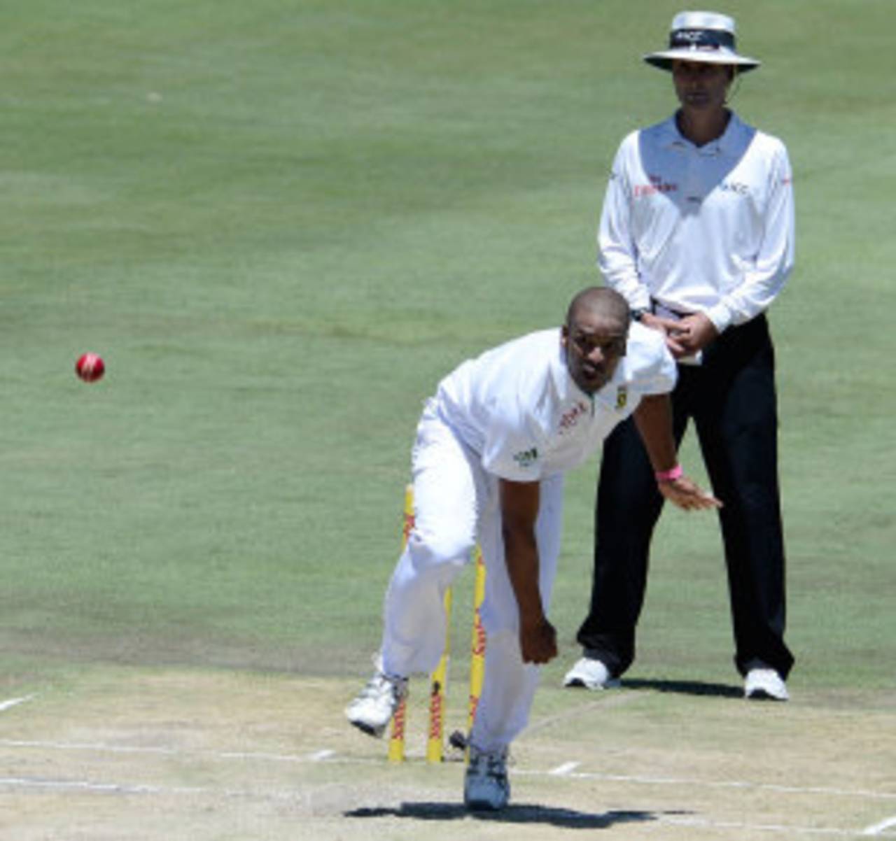 Vernon Philander completes his delivery as umpire Billy Bowden looks on, South Africa v Pakistan, 3rd Test, Centurion, 2nd day, February 23, 2013